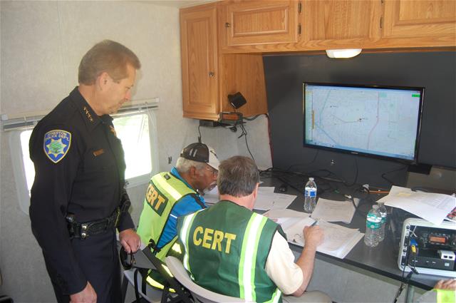 Chief Flint in the refurbished communications trailer.